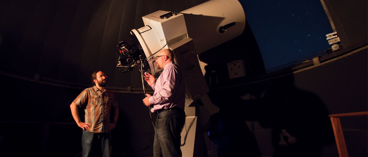 Pepper, right, with Kutztown University astronomer Phillip Reed '08, Ph.D. A CCD camera inside Kutztown's 24-inch telescope takes digital images of exoplanetary transits, in which a planet passes in front of its host star, affecting the star's brightness and yielding possible clues about the elemental composition of its atmosphere. If the astronomers and their students are lucky, their nighttime shift will span all five stages of a transit.