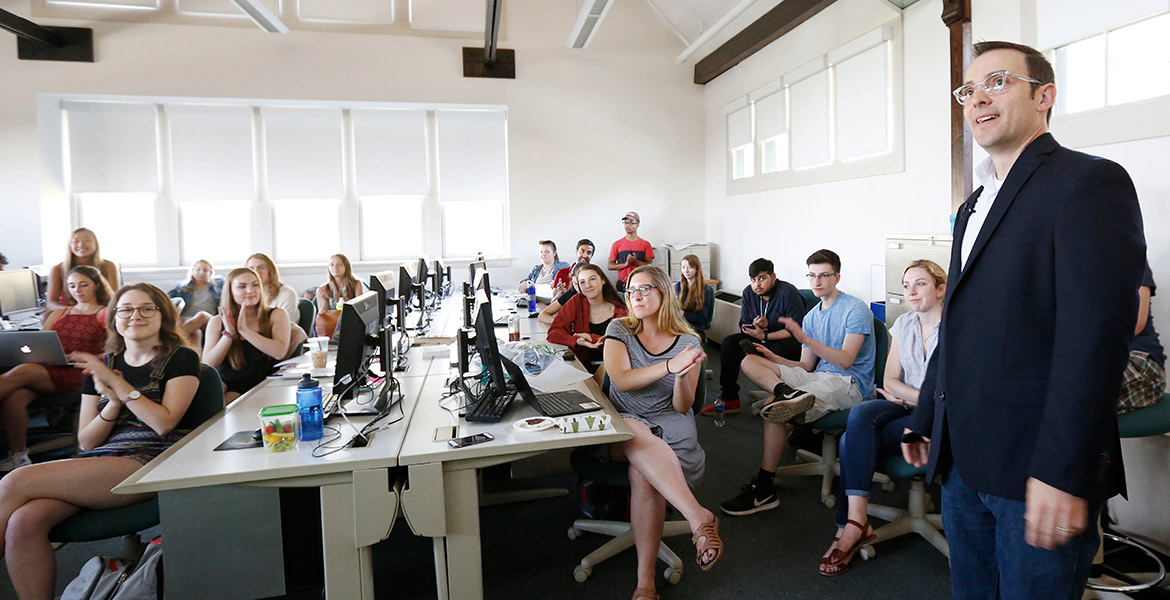 Matt Veto, professor of practice in journalism and communication and faculty adviser to The Brown and White, teaching students