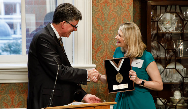 Whitney P. Witt receives a Lehigh medallion as she is installed as dean of the College of Health, pictured here with Provost Pat Farrell