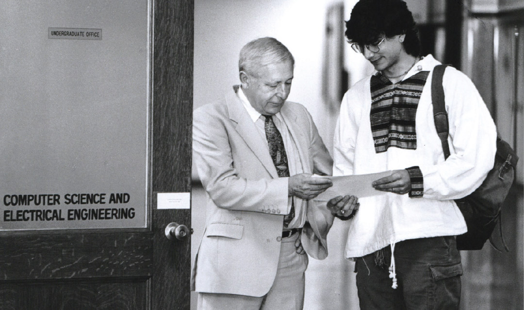 Don Hillman meets with a student