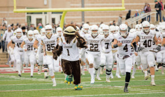 Lehigh football team with Clutch mascot