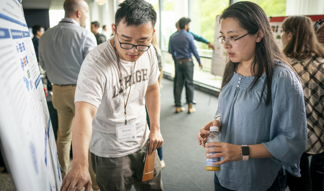 Lehigh student Bowen Li presenting his poster on "Balancing exploration and exploitation to design compact training sets for data-driven molecular property models."