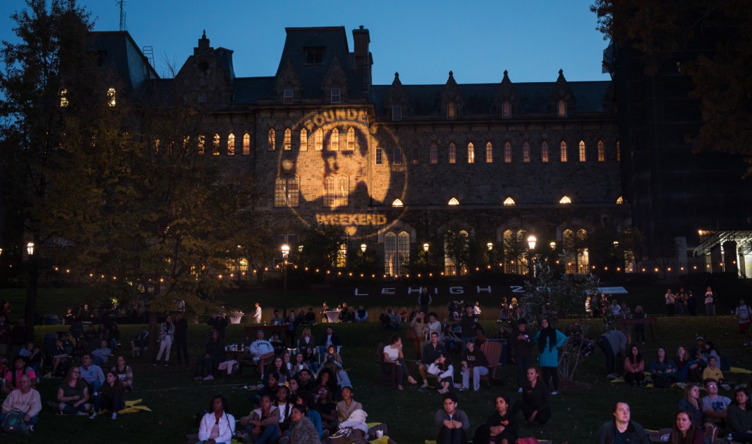 Lehigh's University Center lit up at night at Brown & White BBQ. 