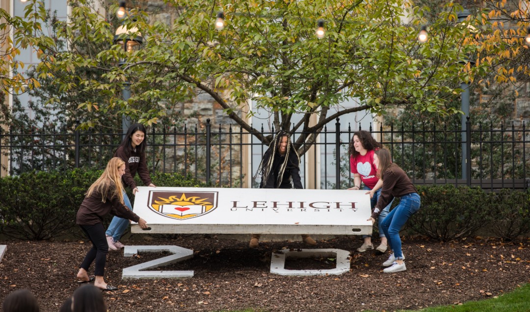 Lehigh students reveal Class of 2020 numbers at Brown & White BBQ. 