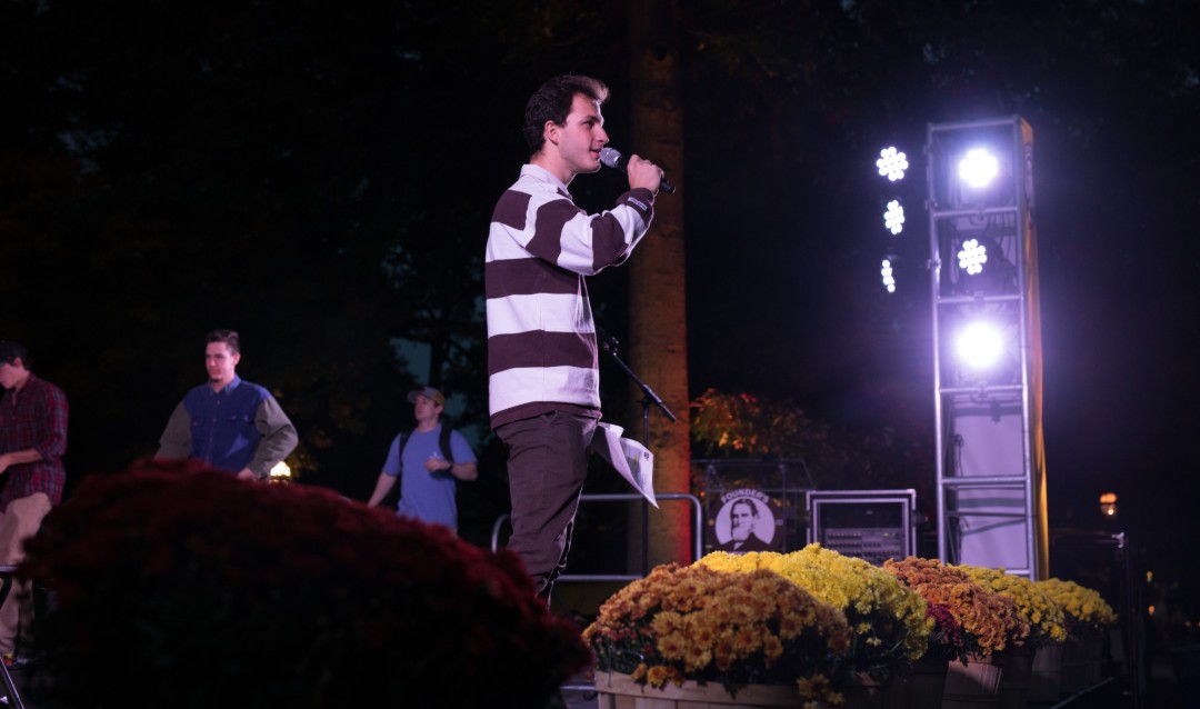 Student emcee at Lehigh University Brown & White BBQ. 