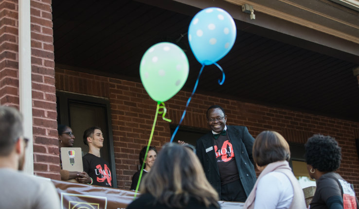 Henry Odi addresses attendees of honor walk