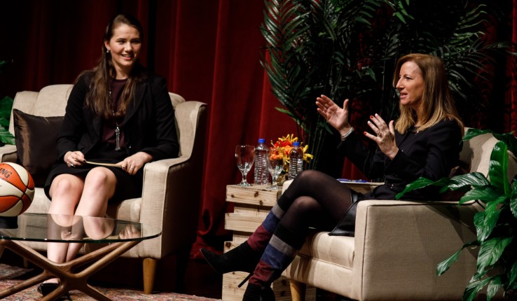 Lehigh student athlete Mary Clougherty sits in armchair on stage facing Cathly Engelbert during a chat-style presentation for the Gruhn Lecture at Lehigh University