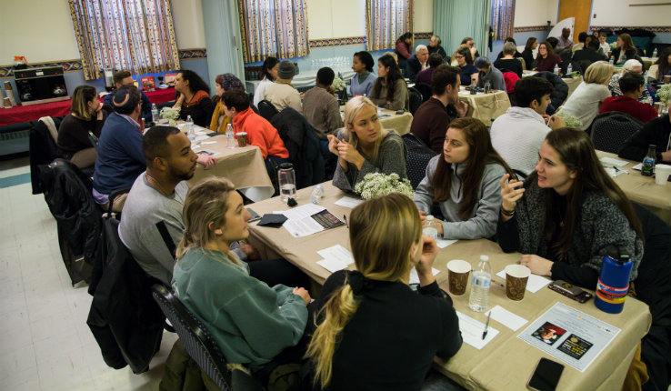 Photo showing all attendees seated at luncheon