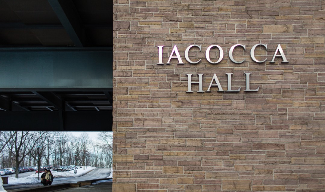 Front of Lehigh University's Iacocca Hall with snow in background