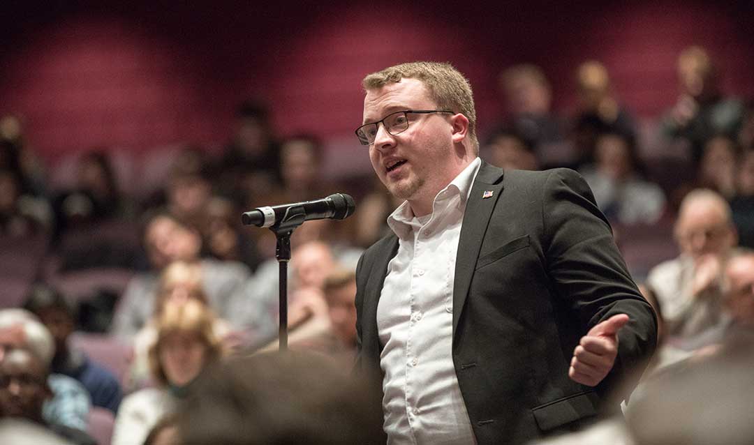 A male student asks Charlie Dent a question after Dent delivered the Lehigh Univeristy Kenner Lecture