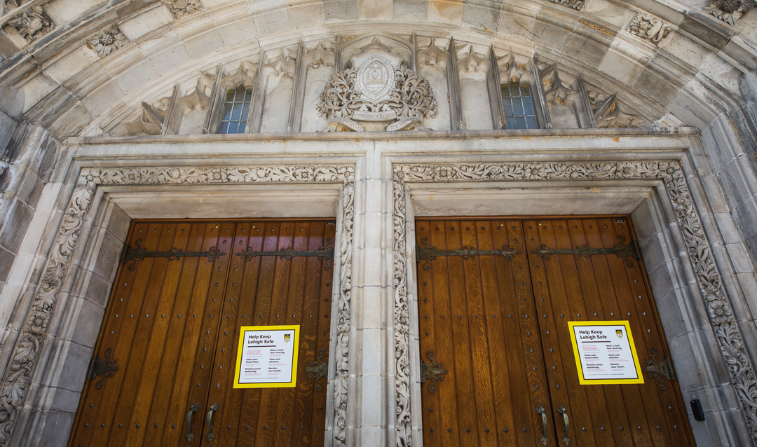 Campus doors with Keep Lehigh safe signs