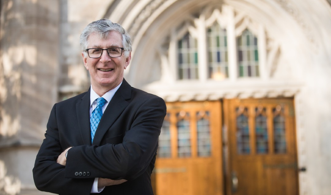 Lehigh President John D. Simon standing in front of Linderman Library doors