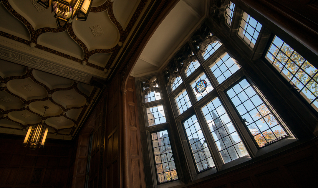 Ryan Hulvat image of the campus through windows