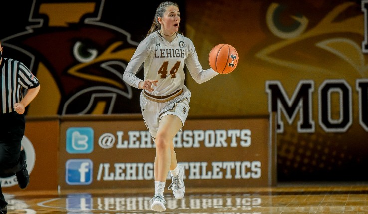 Mary Clougherty dribbling during a basketball game