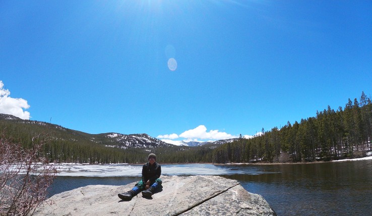 A Lehigh student posing by a lake