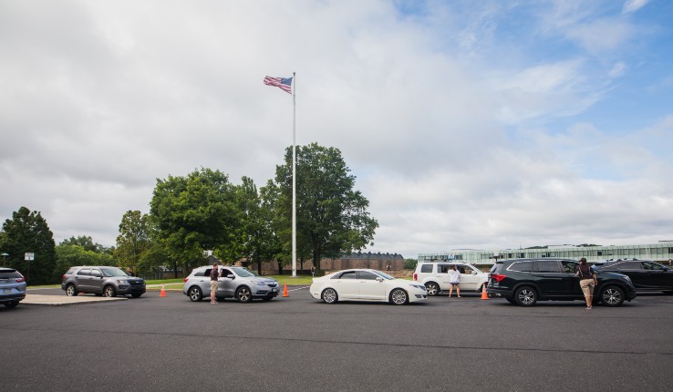 Cars outside of Iacocca Hall checking in