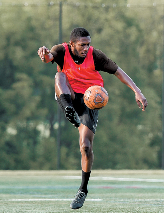 Michael Tahiru ’22 playing soccer