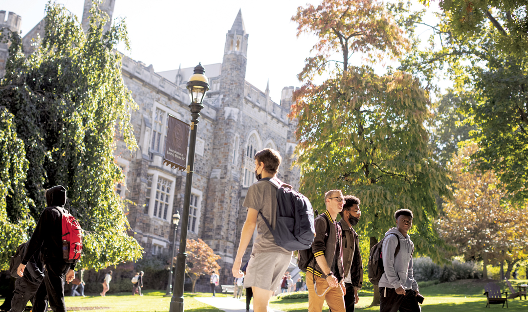 Students walk in front of Linderman Library