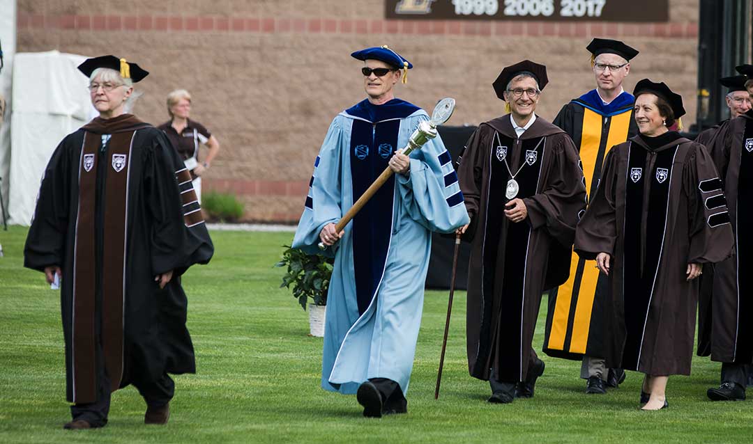 Faculty marching in