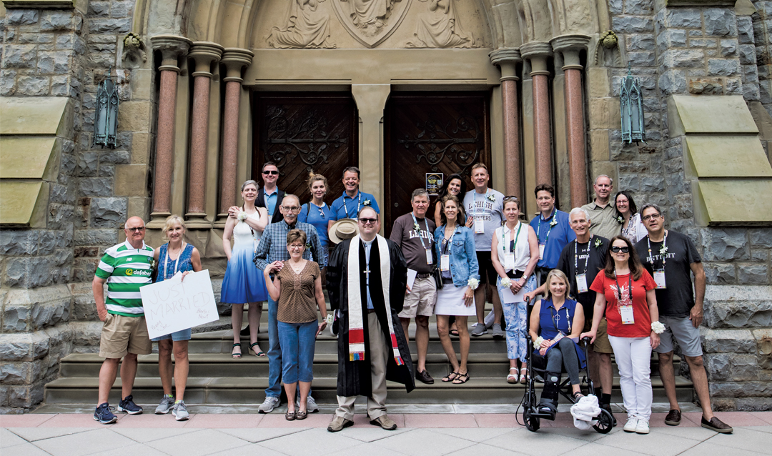 Alumni couples outside Packer Memorial Church