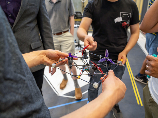 Flying Swarms Team working on their aerial vehicle