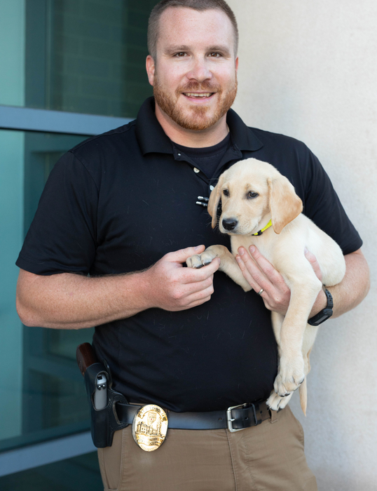 Lt. David Kokinda holds Grace.