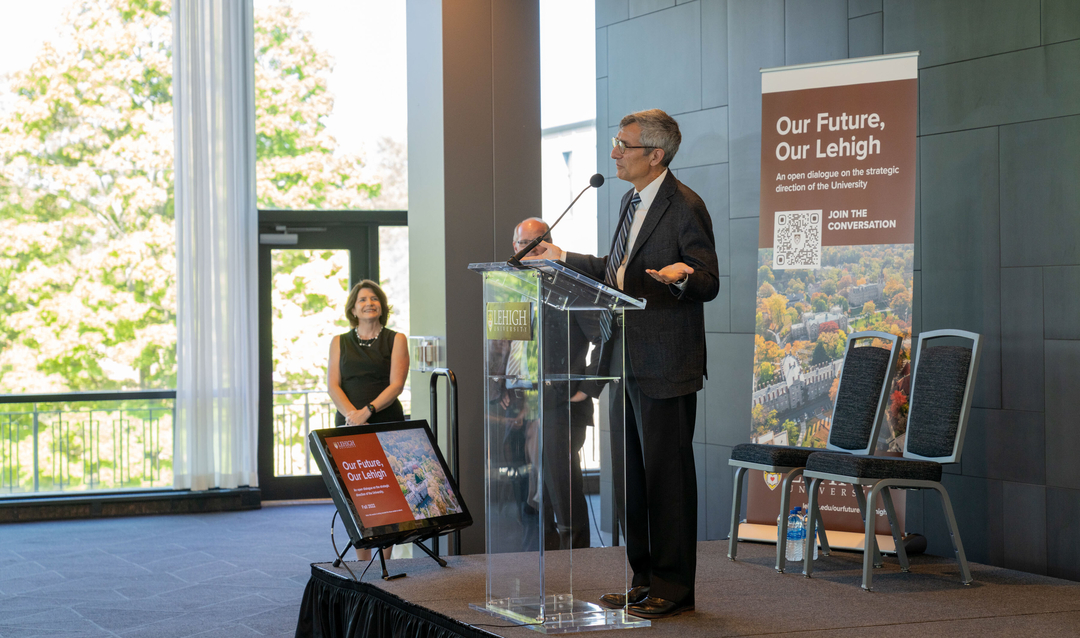 President Joseph J. Helble '82 addresses attendees