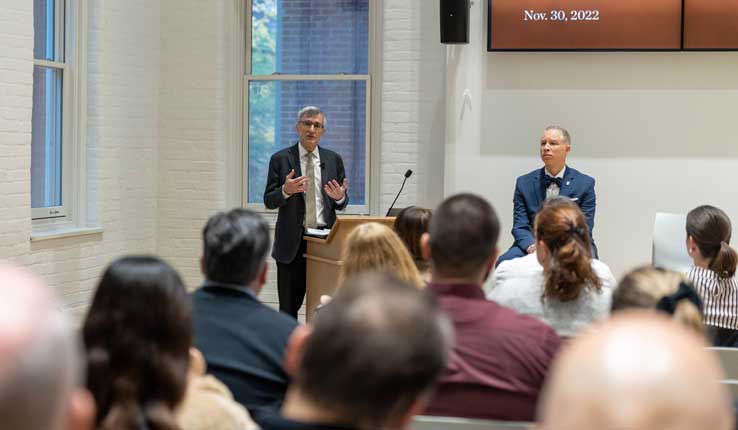 Joseph J. Helble '82 speaks at podium