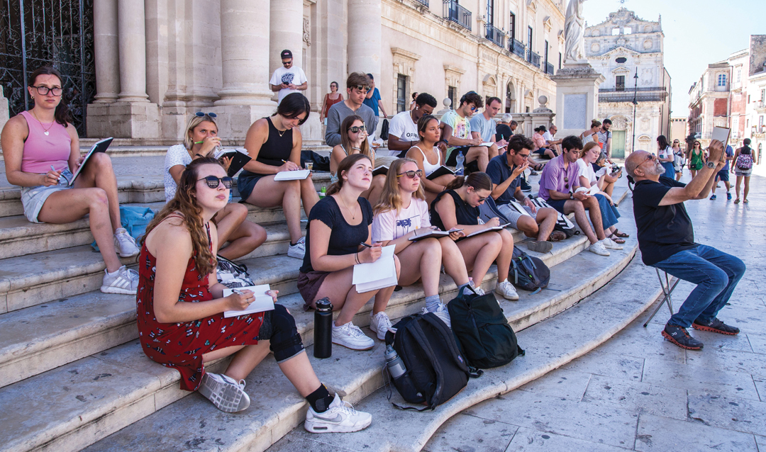 Students sitting on steps