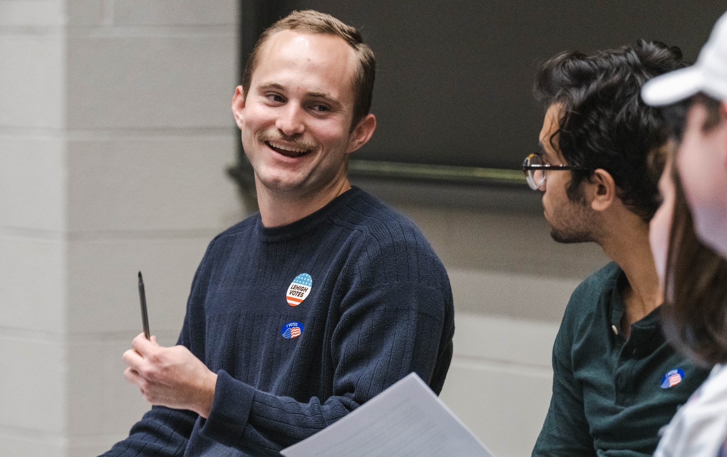 Declan Coster '23 moderates a debate