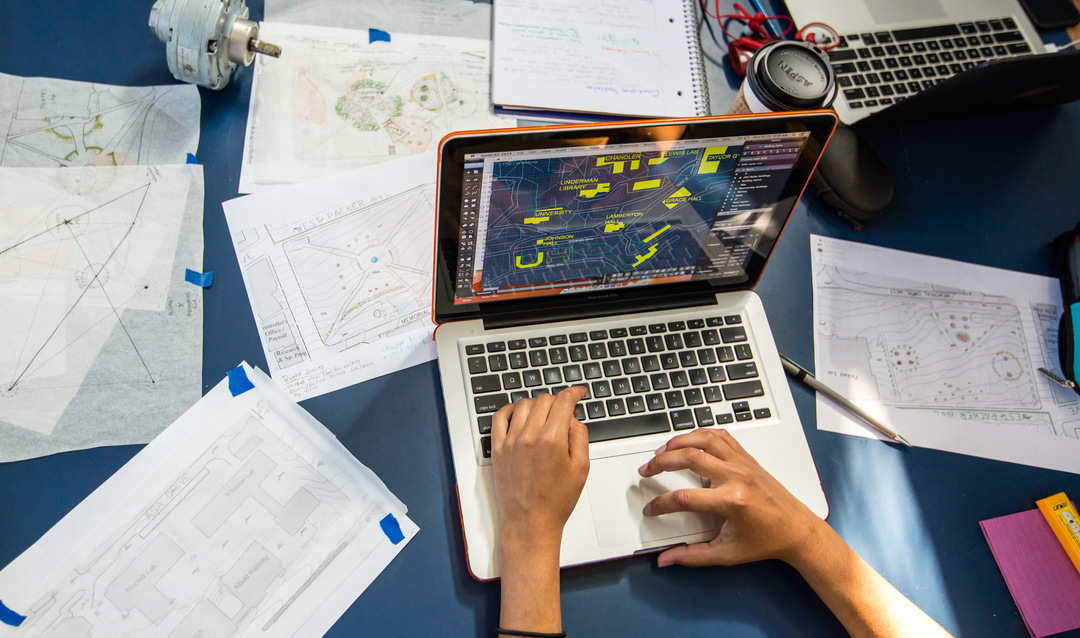 student working on a laptop