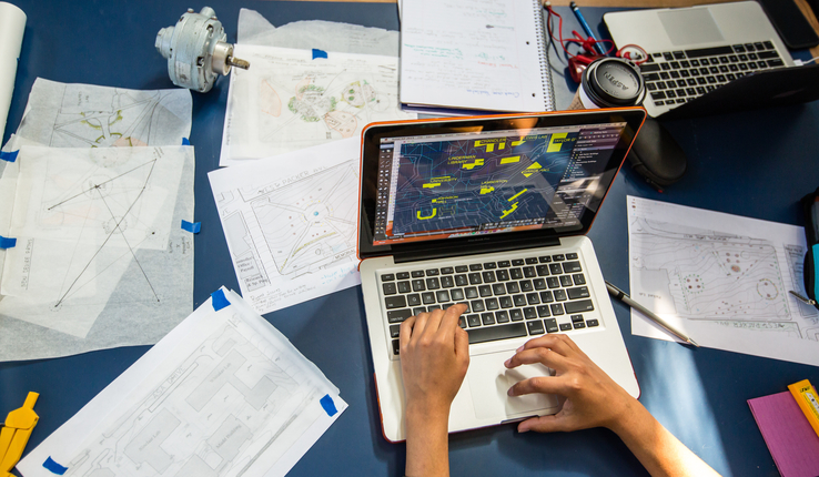 student working on a laptop