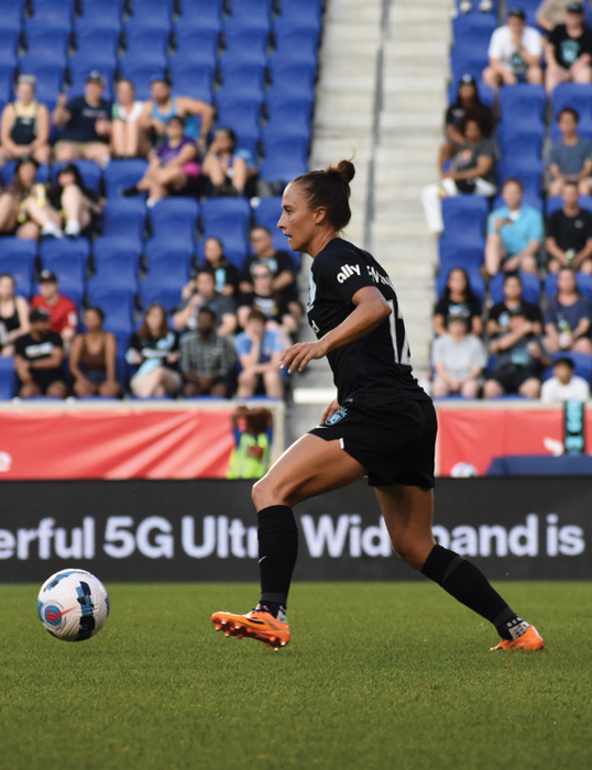 Gina Lewandowski playing soccer