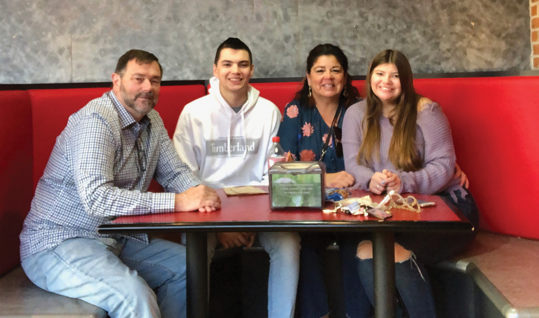 Nic Altenderfer with his mom, dad, and sister