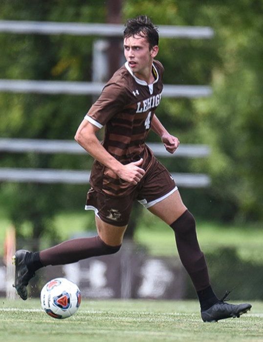 Euan Forrest playing soccer