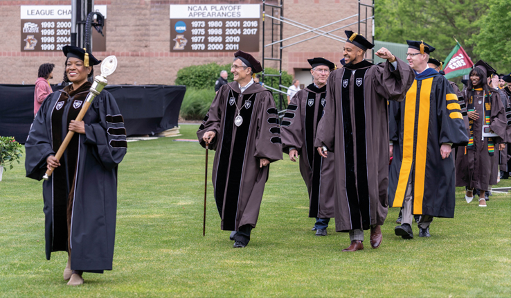 President Helble ’82 and C.J. McCollum ’13