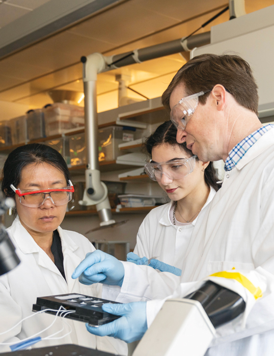 From left, Professor  Xuanhong Cheng, Ph.D. student Nazrin Hasanova '21 and Professor James Gilchrist.