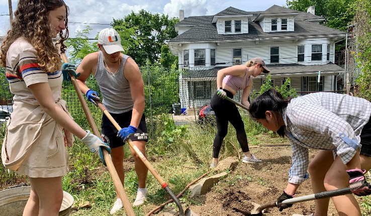 students in permaculture garden