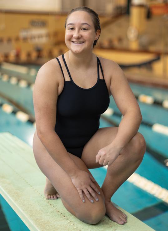 Sarah Gill posing on diving board