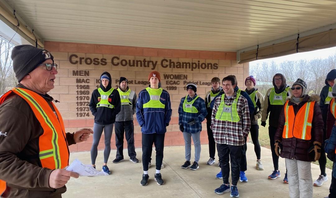 Paul Pagoda gives instructions to volunteers