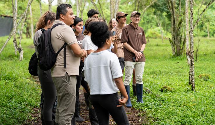 Joseph J. Helble with students in Latin America