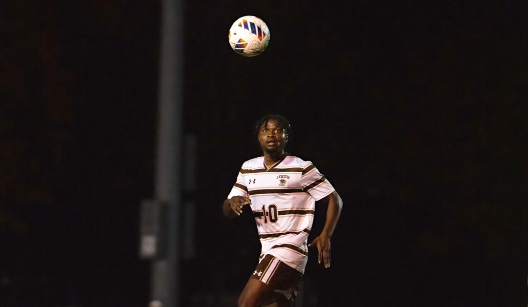 Perry Kingson pursuing a soccer ball