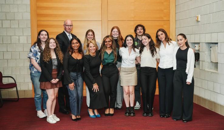 Group photo with students, Katie Couric and Provost Nathan Urban