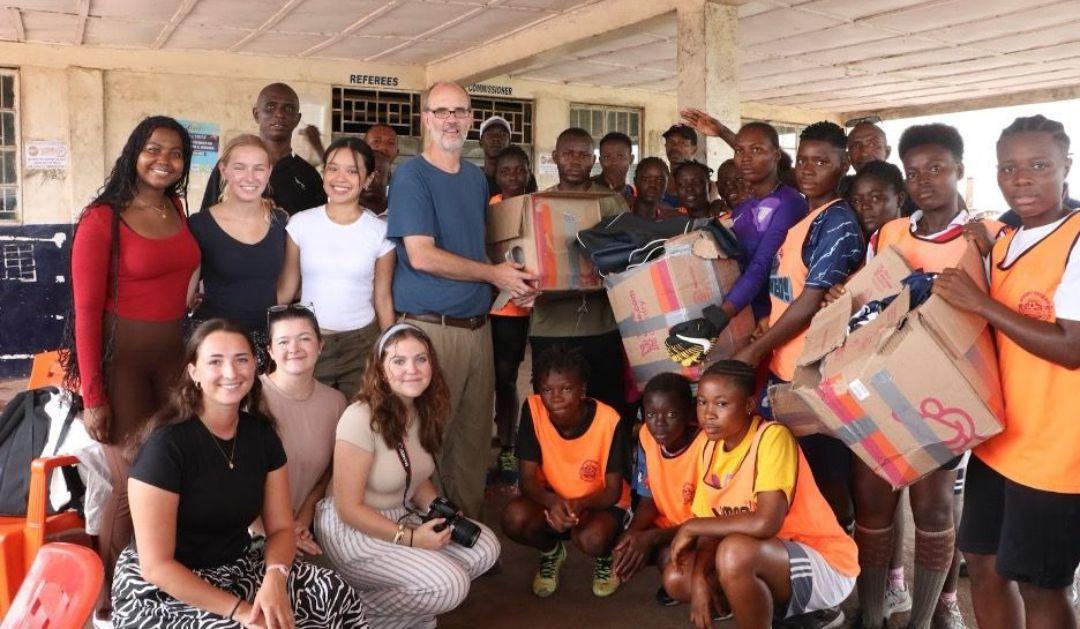 Mothers of Sierra Leone project team gather together during fieldwork.