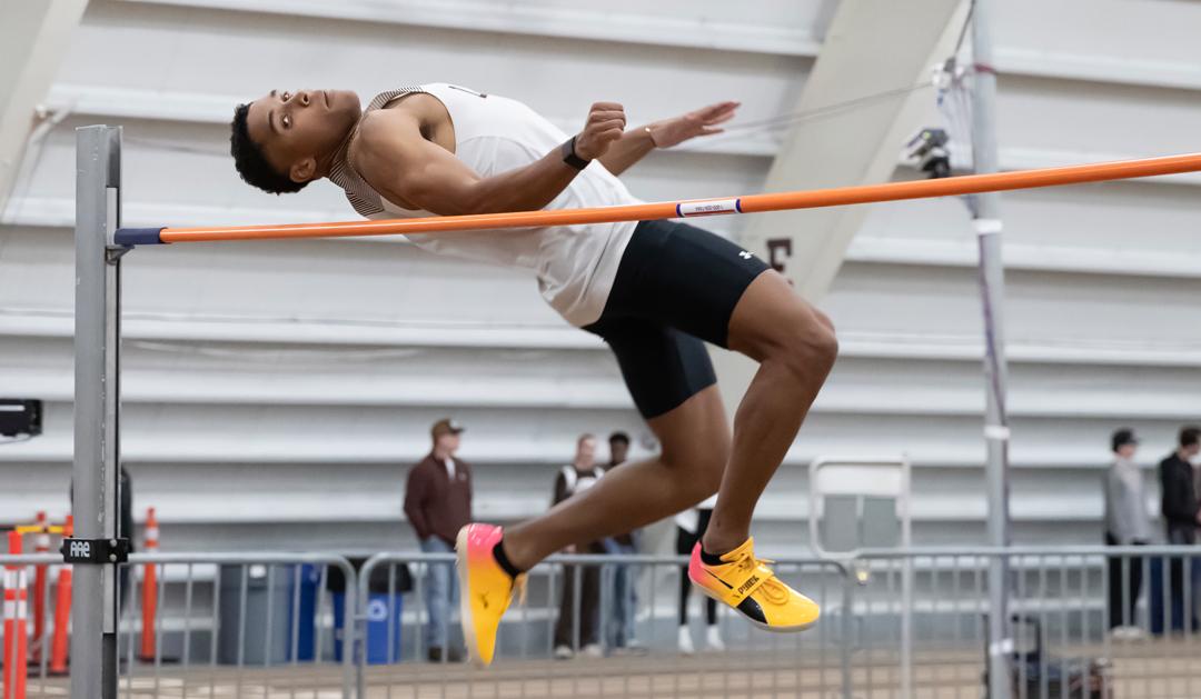 Skyler Mott at a meet participating in the high jump.