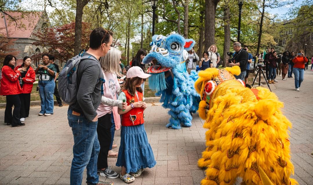 Chinese dragons interacting with crowd