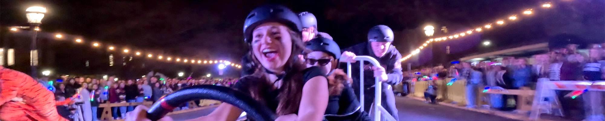People riding go carts