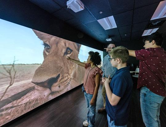 Students in front of screen