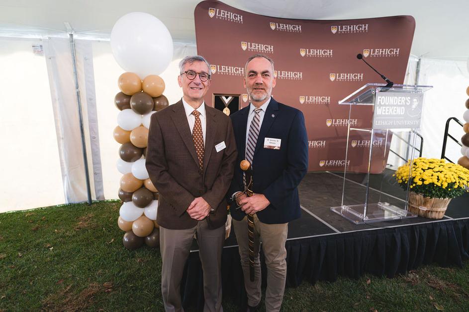 President Joseph J. Helble '82 and Murray H. Goodman Dean of Athletics Jeremy L. Gibson