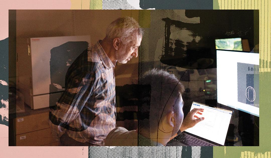 Two researchers at a work station